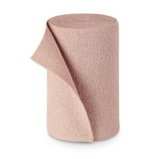 A roll of light brown textured PütterFlex fabric from Paul Hartmann AG, standing upright, with a slightly unrolled end, against a white background.